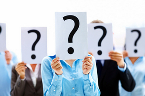 BUSINESS PEOPLE WITH QUESTION MARK © Yuri_arcurs | Dreamstime.com