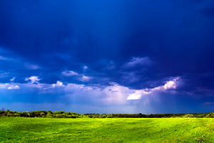 GREEN FIELD. RAIN IN THE DISTANCE. - © Aibolit | Dreamstime.com